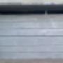 Porton levadizo mas puerta lateral E.D.S.I.